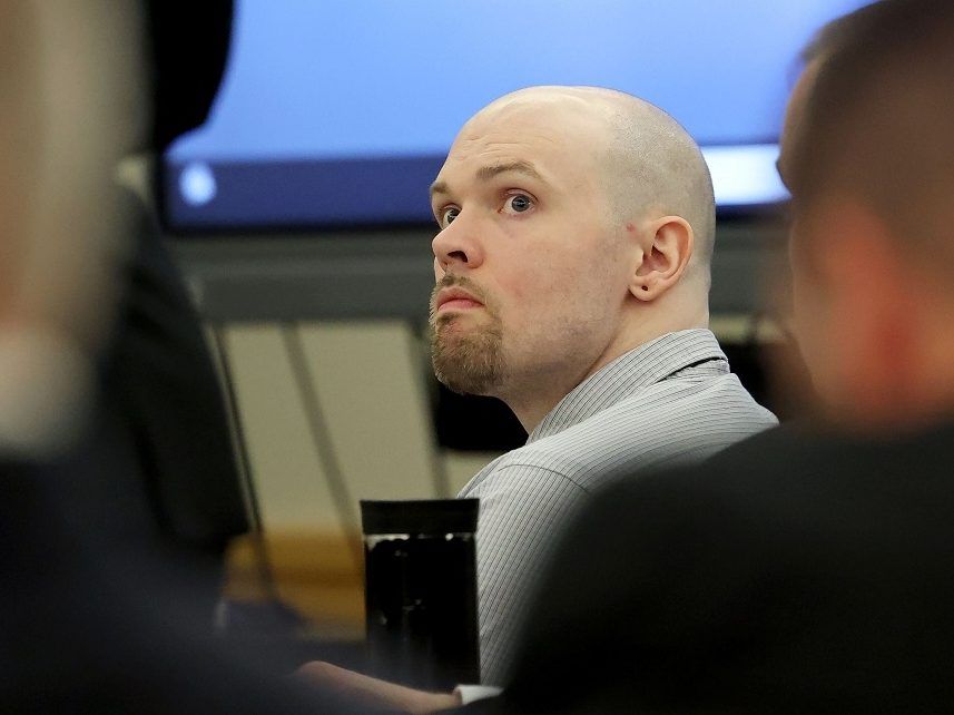 Defendant Tanner Horner looks up at his defence team before pleading guilty to capital murder in the November 2022 strangulation killing of 7-year-old Athena Strand, Tuesday, April 7, at the Tim Curry Criminal Justice Center in Fort Worth, Texas. 