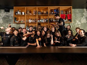 The staff at Mother Cocktail Bar is pictured in this handout photo.