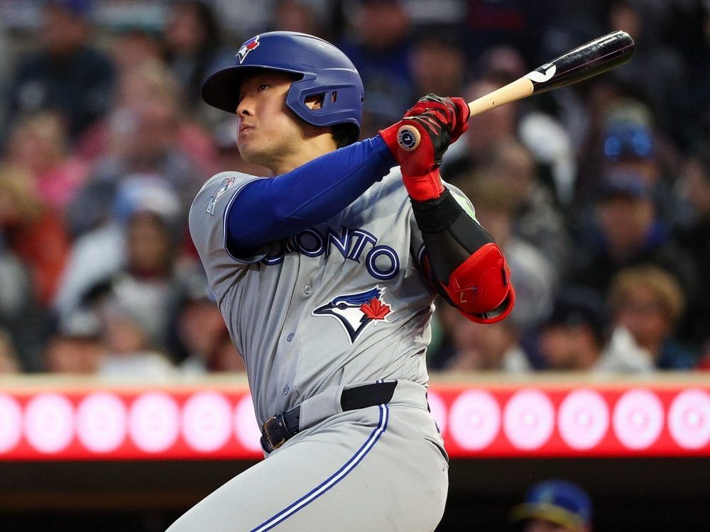 Kazuma Okamoto of the Toronto Blue Jays hits a two-run home run against the Minnesota Twins during the fifth inning at Target Field on May 1, 2026 in Minneapolis, Minn.