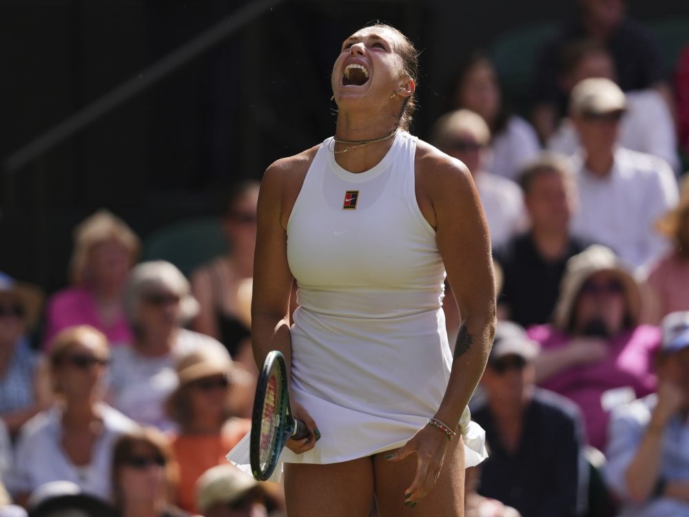 Aryna Sabalenka of Belarus shouts during the women's singles semifinal match against Amanda Anisimova at Wimbledon Tennis Championships in 2025.