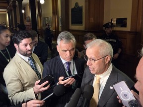 Ontario Economic Development Minister Vic Fedeli answers reporters' questions.