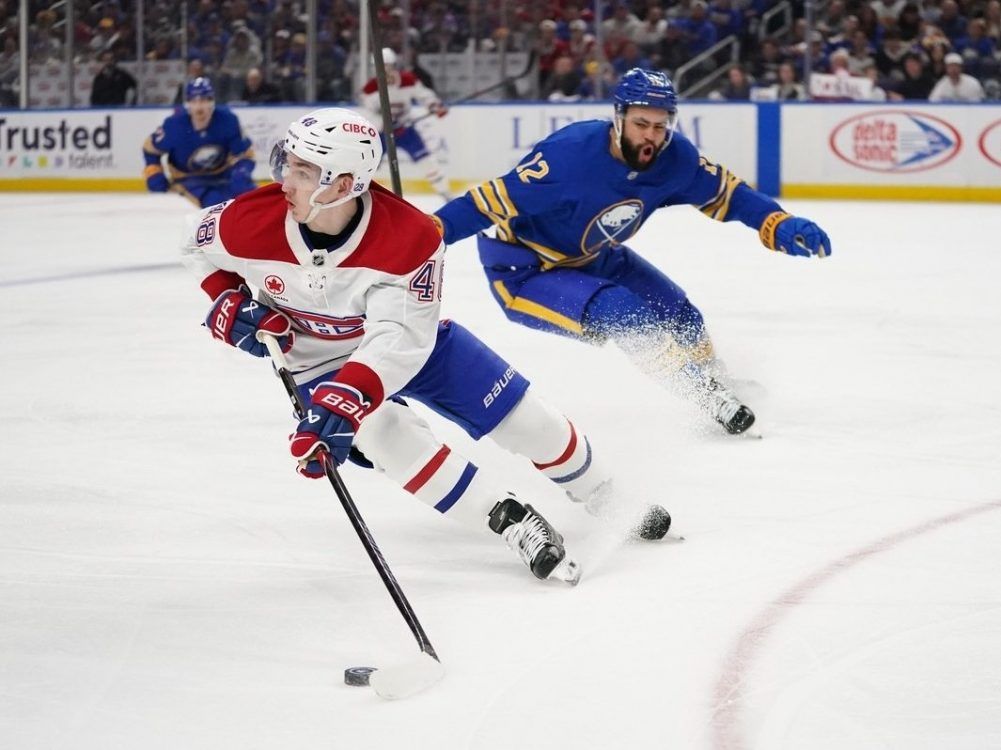 Buffalo Sabres left wing Jordan Greenway (12) chases Montréal Canadiens defenseman Lane Hutson (48) in the second period of Game 5 of their second-round Stanley Cup playoff series at KeyBank Center on Thursday, May 14, 2026.