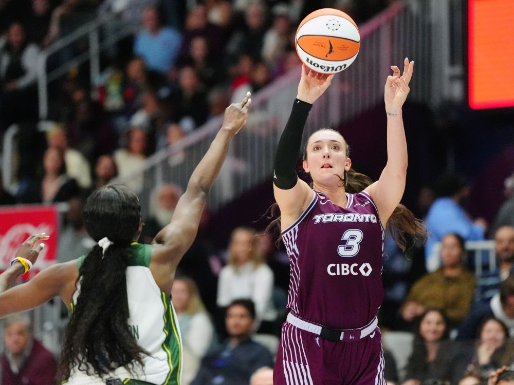 Toronto Tempo's Marina Mabrey shoots a 3 pointer against Seattle Storm's Flau'jae Johnson.