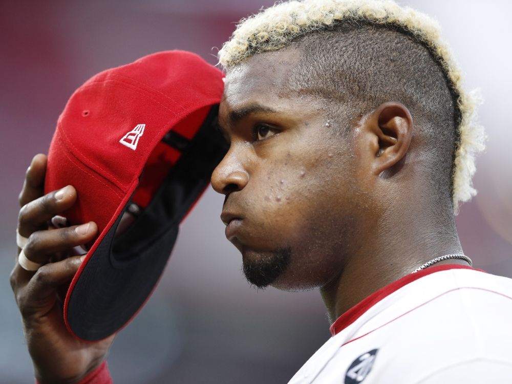 Yasiel Puig of the Cincinnati Reds reacts during a game against the Colorado Rockies in 2019.