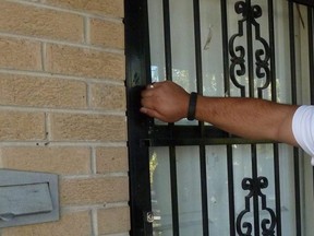 A person knocks at a neighbour's door.