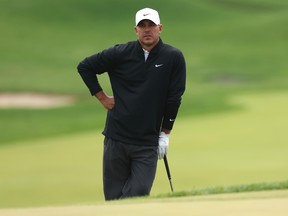 Brooks Koepka looks on from the 11th hole during the first round of the PGA Championship at Aronimink Golf Club.