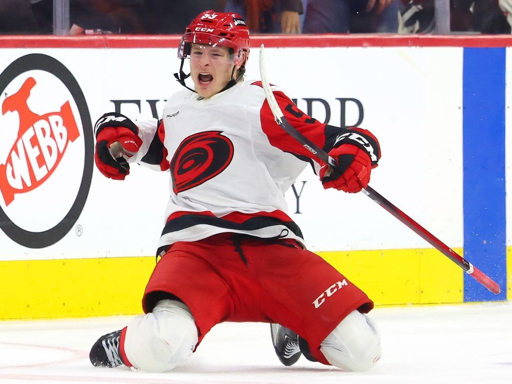 Jackson Blake of the Carolina Hurricanes celebrates after scoring the game-winning goal against the Philadelphia Flyers during overtime in Game 4.