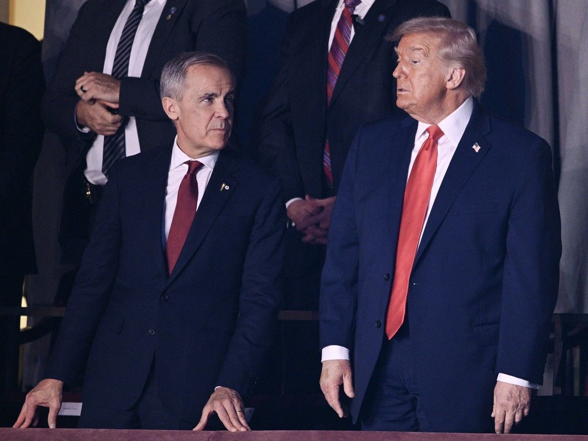 Prime Minister Mark Carney and U.S. President Donald Trump attend the draw for the 2026 FIFA Football World Cup taking place in the U.S., Canada and Mexico, at the Kennedy Center, in Washington, DC, on Dec. 5, 2025.