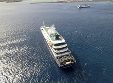 An aerial view of the cruise ship MV Hondius, stationary off the port of Praia, Cape Verde, on Sunday, May 3, 2026.