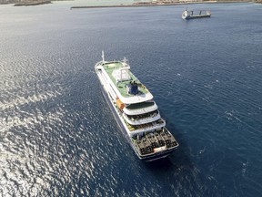 An aerial view of the cruise ship MV Hondius, stationary off the port of Praia, Cape Verde, on Sunday, May 3, 2026.