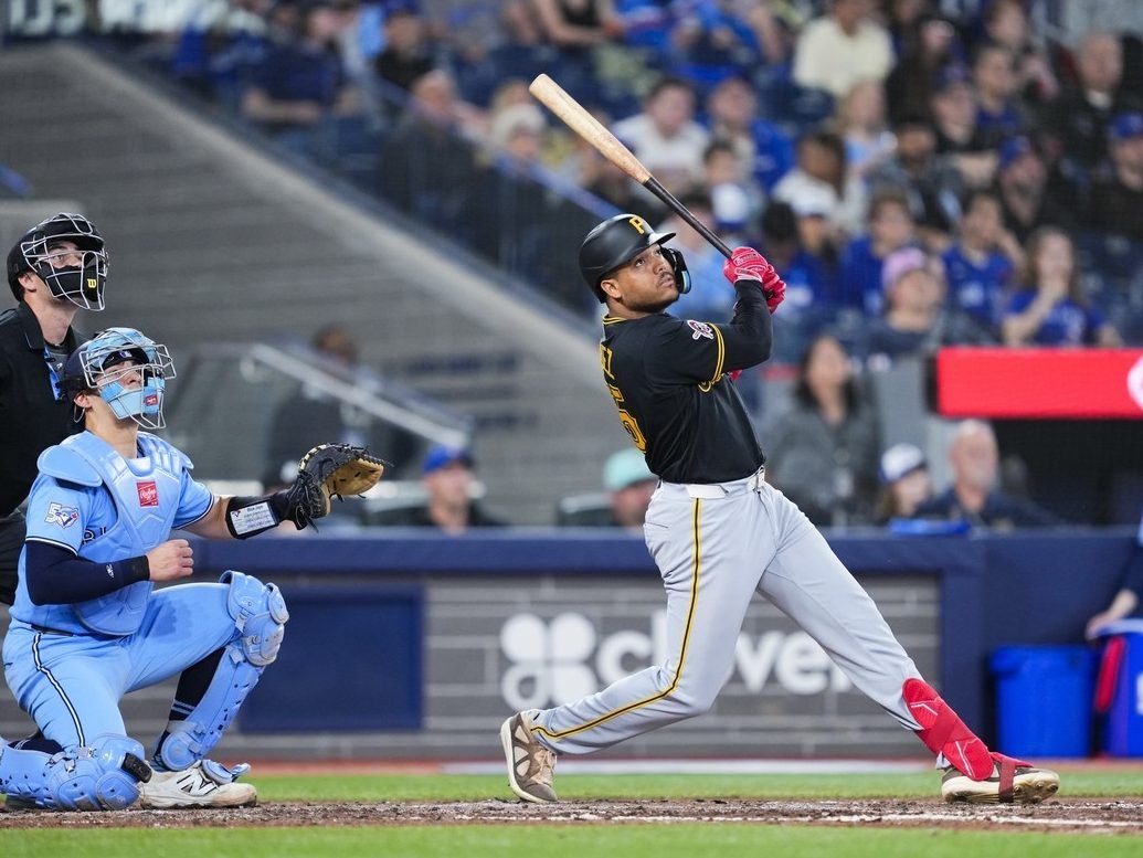 Esmerlyn Valdez #55 of the Pittsburgh Pirates hits his first career MLB home run against the Toronto Blue Jays during the sixth inning in their MLB game at the Rogers Centre on May 24, 2026 in Toronto, Ontario, Canada.