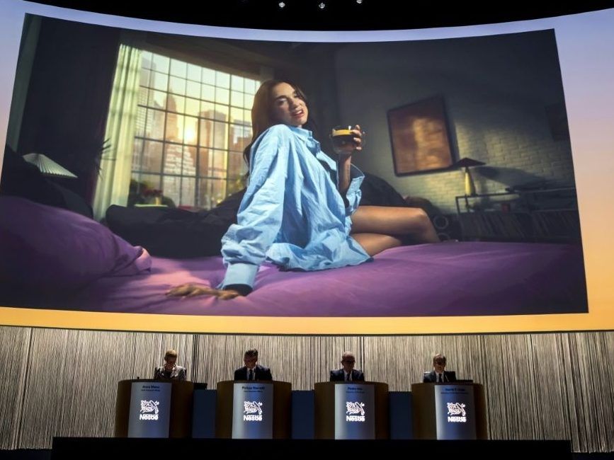 Dua Lipa, shown here in an advertising campaign for Nespresso, is suing Samsung over alleged copyright violations over the use of the singer's image on a television box.