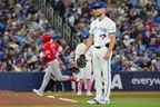 Toronto Blue Jays pitcher Eric Lauer looks on as Los Angeles Angels second baseman Oswald Peraza rounds the bases after hitting a two-run home run during the top of the fifth inning in Toronto on Sunday, May 10, 2026.