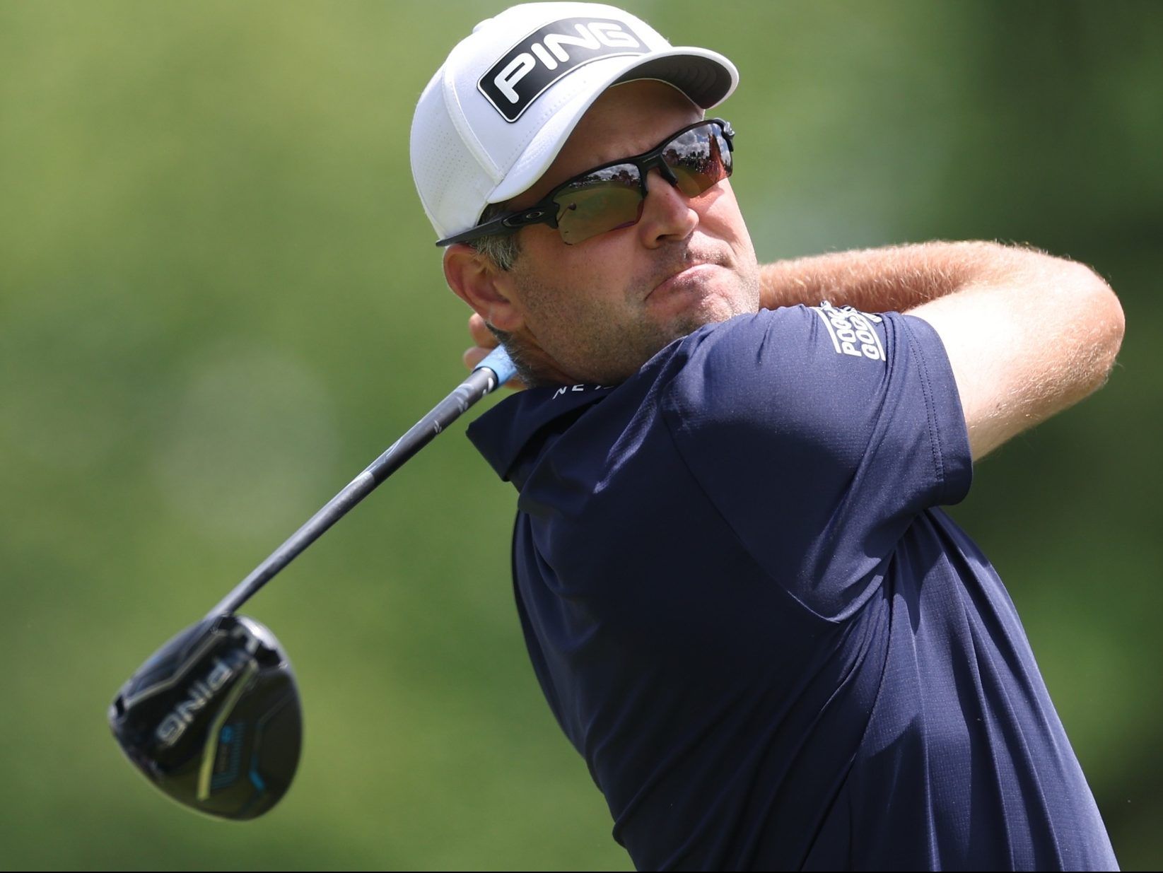 Corey Conners of Canada plays his shot from the second tee during the first round of the PGA Championship at Aronimink Golf Club on Thursday in Newtown, Pennsylvania. 
