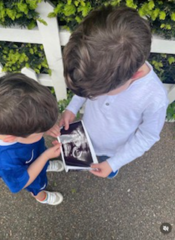  Princess Eugenie’s sons hold sonogram of their upcoming third addition to the family (Princess Eugenie/Instagram)