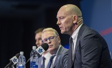 MLSE President & CEO Keith Pelley (middle) announces John Chayka (left) as Toronto Maple Leafs General Manager and Leaf legend Mats Sundin as Senior Executive Advisor during a press conference held at Real Sports Bar & Grill in Toronto on Monday May 4, 2026.