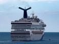 The Carnival Liberty cruise ship leaves Port Canaveral on Aug. 26, 2022 in Cape Canaveral, Fla.