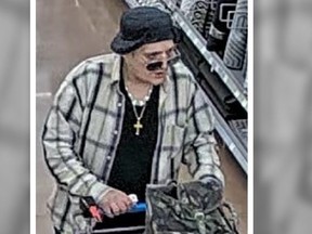 An image from Hamilton Police of a person sought in a May 1 arson probe.