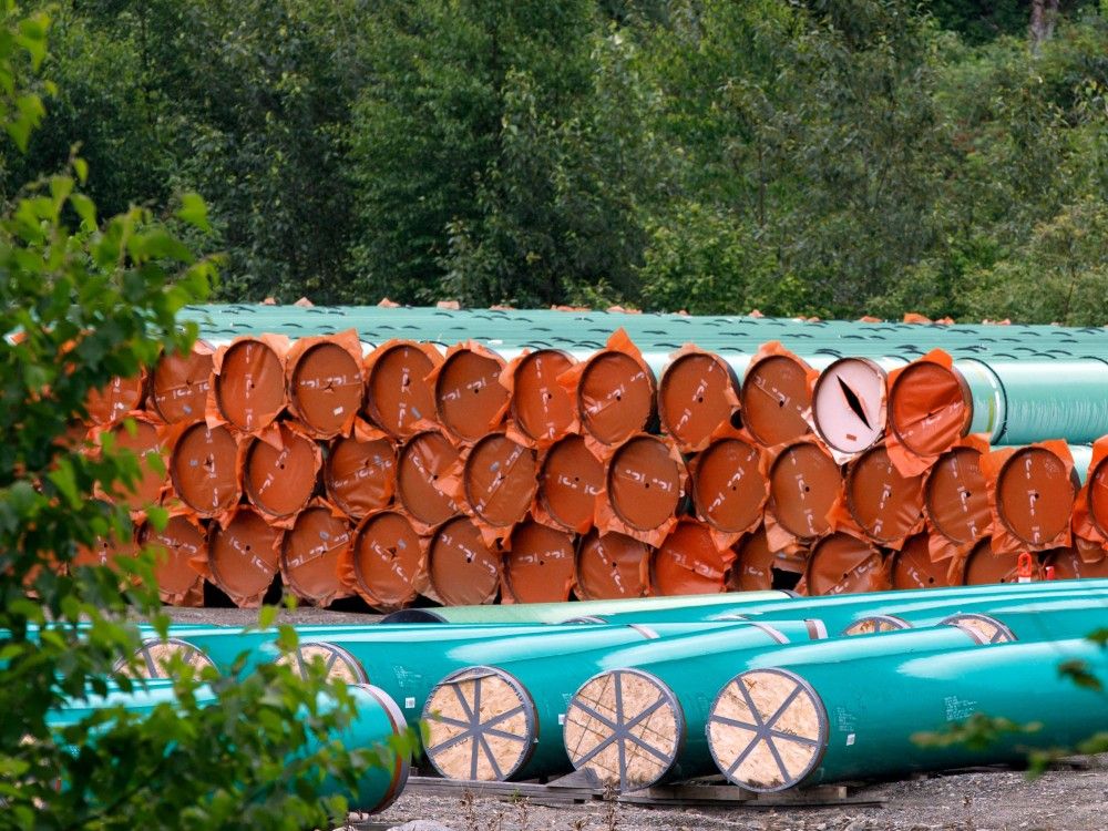 Pieces of the Trans Mountain Pipeline project sit in a storage lot outside Hope, B.C., June 6, 2021.