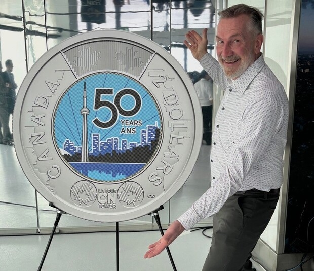  Belleville graphic artist and illustrator Carl Wiens is shown March 31, 2026 at the unveiling by Royal Canadian Mint in Ottawa of its new $2 toonie featuring his artwork marking the 50th anniversary of Toronto’s CN Tower completion in 1976.