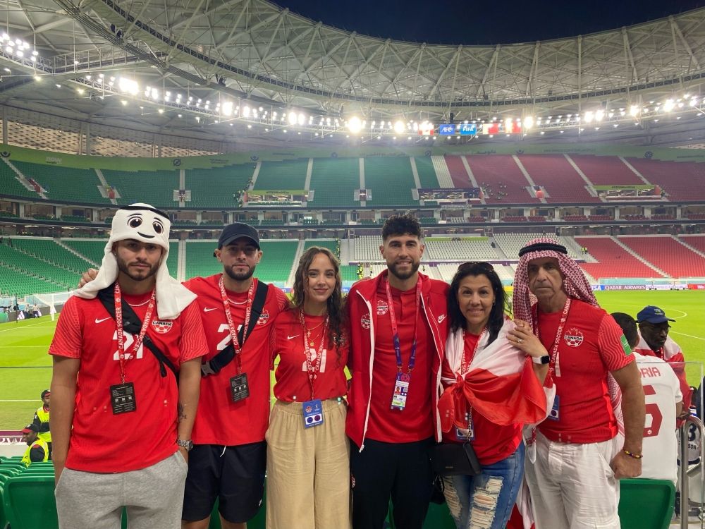 Canadian midfielder Jonathan Osorio (third from right) and his family at the 2022 FIFA World Cup in Qatar.