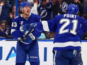 Darren Raddysh of the Tampa Bay Lightning celebrates his goal against the Montréal Canadiens during the 2026 Stanley Cup playoffs.
