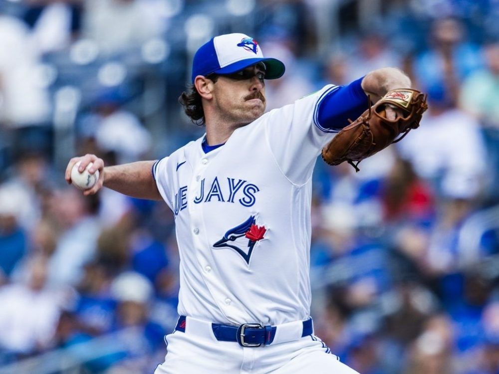 Comeback goes for naught, Jays fall back below .500 in extra-innings loss