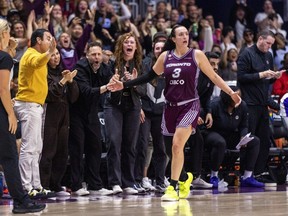 Marina Mabrey celebrates after scoring 53 points