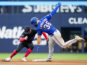 Wyatt Langford slides in safely to second base