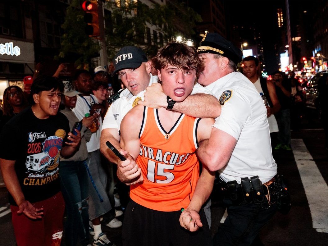 NYPD officers arrest a person during Game 4 of the NBA Finals between New York Knicks and San Antonio Spurs, on June 10, 2026 in New York City.  