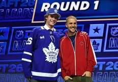 Gavin McKenna and Justin Bieber look on after McKenna was drafted by the Toronto Maple Leafs with the first overall pick during day one of the 2026 NHL Draft in Buffalo.