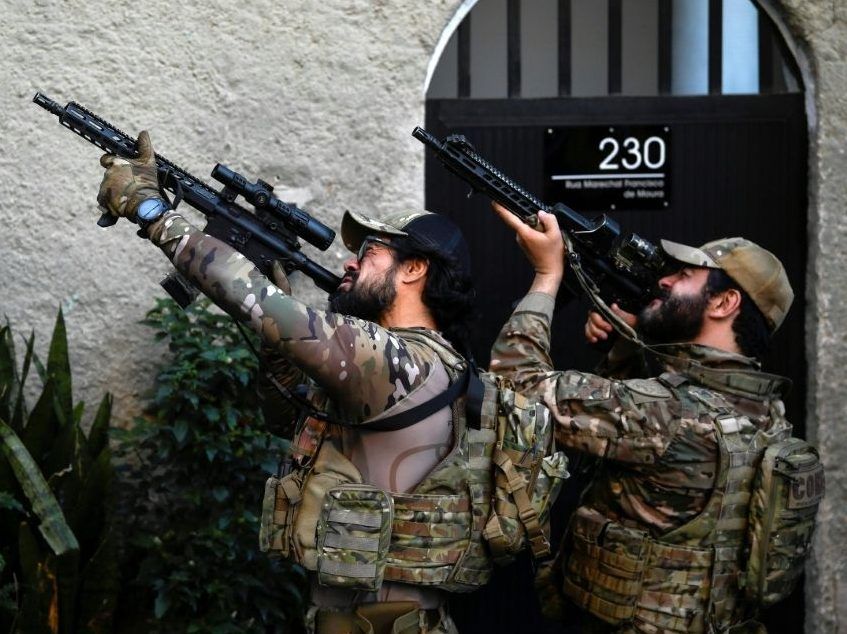 Cops vs gangs shootout traps tourists at Rio de Janeiro sunrise lookout
