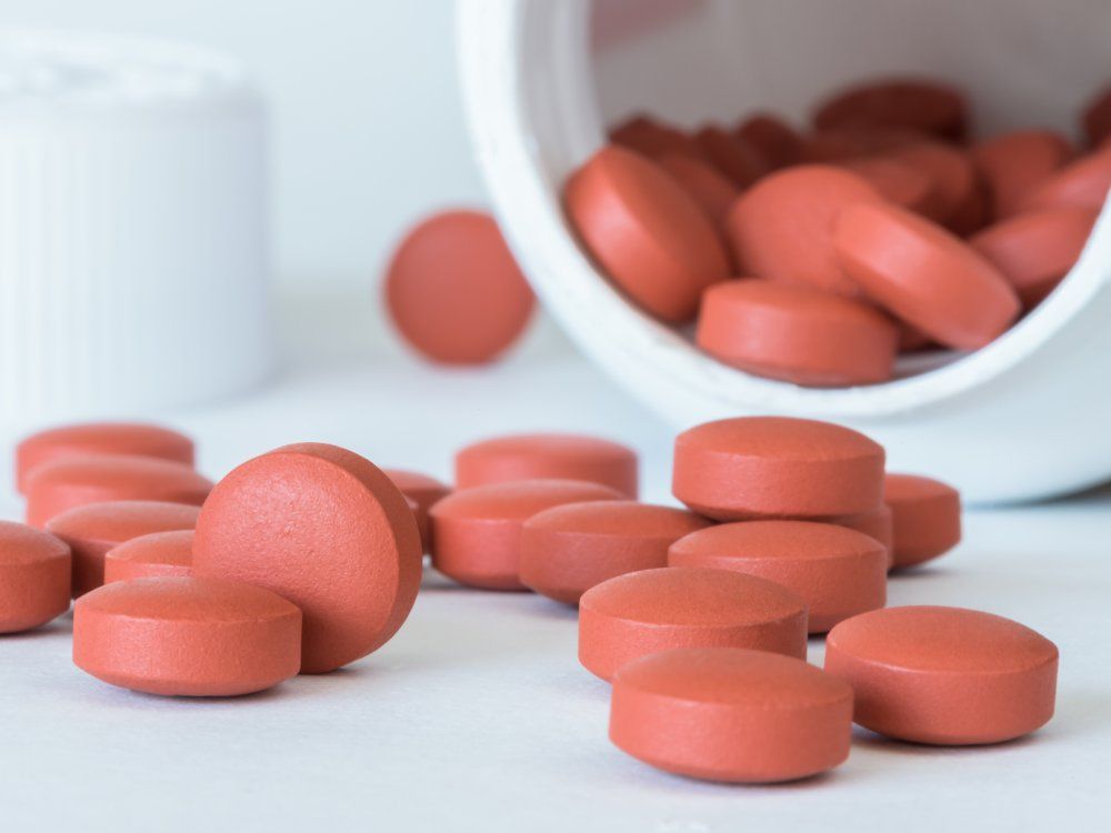 Ibuprofen Tablets Spilled from the Bottle