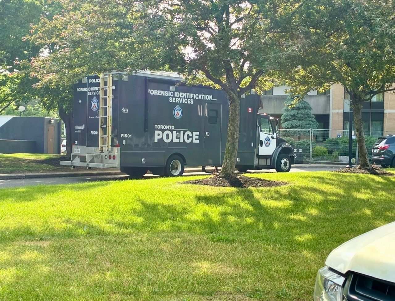 Toronto Police at the scene after an officer was shot on Martha Eaton Way on Thursday, June 11, 2026.