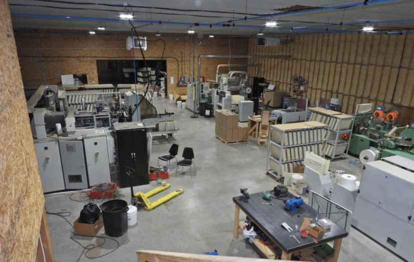 OPP has charged two men from the GTA after busting a contraband tobacco manufacturing facility on Six Nations