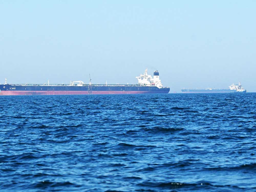 The Al-Riqqa oil tanker (left) and Al-Yarmouk oil tankers sail in the Arabian Gulf waters, off the coast of Kuwait City on June 27, 2026. 