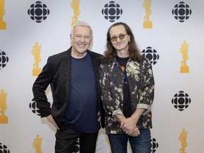 Canadian rock icons Alex Lifeson and Geddy Lee of Rush after performing at the 2026 Juno Awards in Hamilton, Ont., on Sunday March 29, 2026.