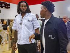 Kawhi Leonard (left) greets Toronto Raptors legend Kyle Lowry who announced his retirement from the NBA.
