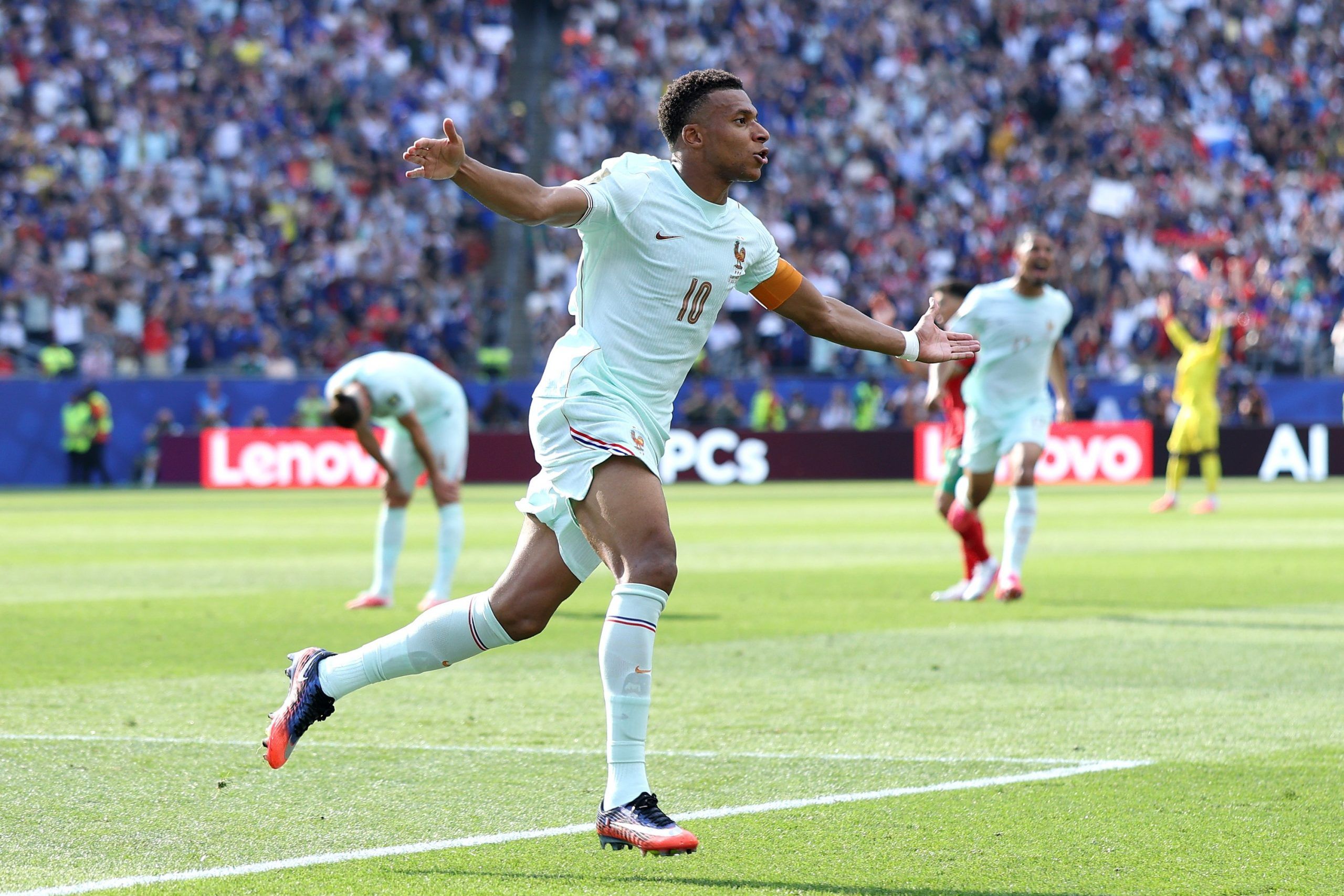 Kylian Mbappé of France celebrates after scoring his team's first goal during a World Cup quarter-final match against Morocco at Boston Stadium on July 9 in Foxborough, Mass.