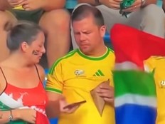Two South Africa fans were seen arguing in the stands during a FIFA World Cup match.