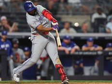 Toronto Blue Jays' Vladimir Guerrero Jr. hits a sacrifice fly allowing Andrés Giménez to score against the New York Yankees earlier this year.