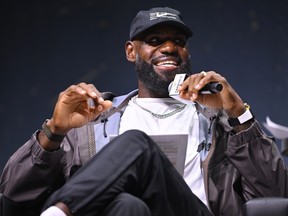 LeBron James speaks onstage during a panel at Fanatics Fest NYC 2026.