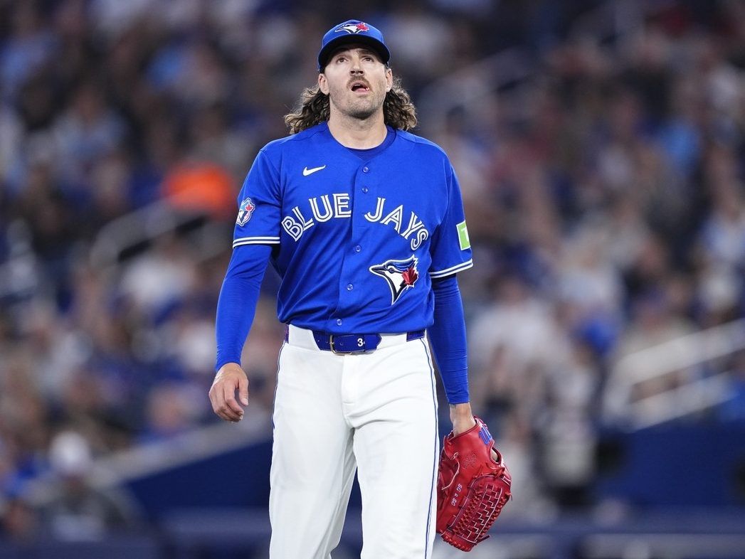 Kevin Gausman #34 of the Toronto Blue Jays walks off the mound after the third out of the first inning against the Tampa Bay Rays in their MLB game at the Rogers Centre on July 21, 2026 in Toronto, Ontario, Canada.