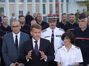 France's President Emmanuel Macron speaks to the press.