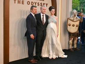 Matt Damon, Christopher Nolan and Anne Hathaway.