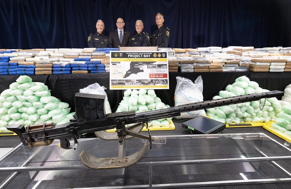 ANTI-TANK WEAPON FOR PEEL TRAFFIC: Windsor Police Deputy Chief Kenneth Cribley, left, Windsor Mayor Drew Dilkens, Chief Jason Crowley and Deputy Chief Karel DeGraaf pose with seized drugs during a press conference on Thursday, July 23, 2026 at Windsor City Hall. DAN JANISSE/POSTMEDIA ANTI-TANK WEAPON FOR PEEL TRAFFIC: Windsor Police Deputy Chief Kenneth Cribley, left, Windsor Mayor Drew Dilkens, Chief Jason Crowley and Deputy Chief Karel DeGraaf pose with seized drugs during a press conference on Thursday, July 23, 2026 at Windsor City Hall. DAN JANISSE/POSTMEDIA