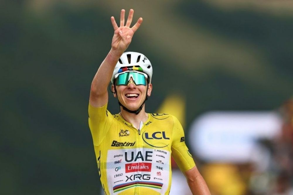Pogacar wins ‘unforgettable’ Tour de France 14th stage to extend overall lead