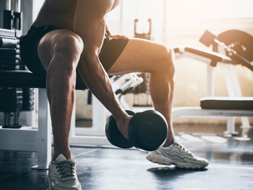 strong man exercising in the sport gym