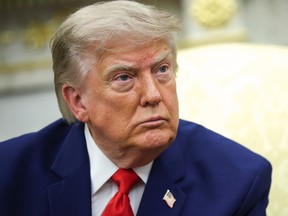 U.S. President Donald Trump listens to a reporter's question as he holds a bilateral meeting with President of Lebanon Joseph Aoun in the Oval Office of the White House in Washington, D.C., Tuesday, July 21, 2026.