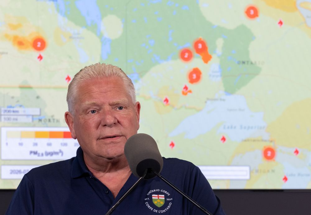 Premier Doug Ford speaks during a press conference to provide an update on the evacuations and forest fires at the Emergency Management HQ in Toronto, Ontario on Monday, July 20, 2026.